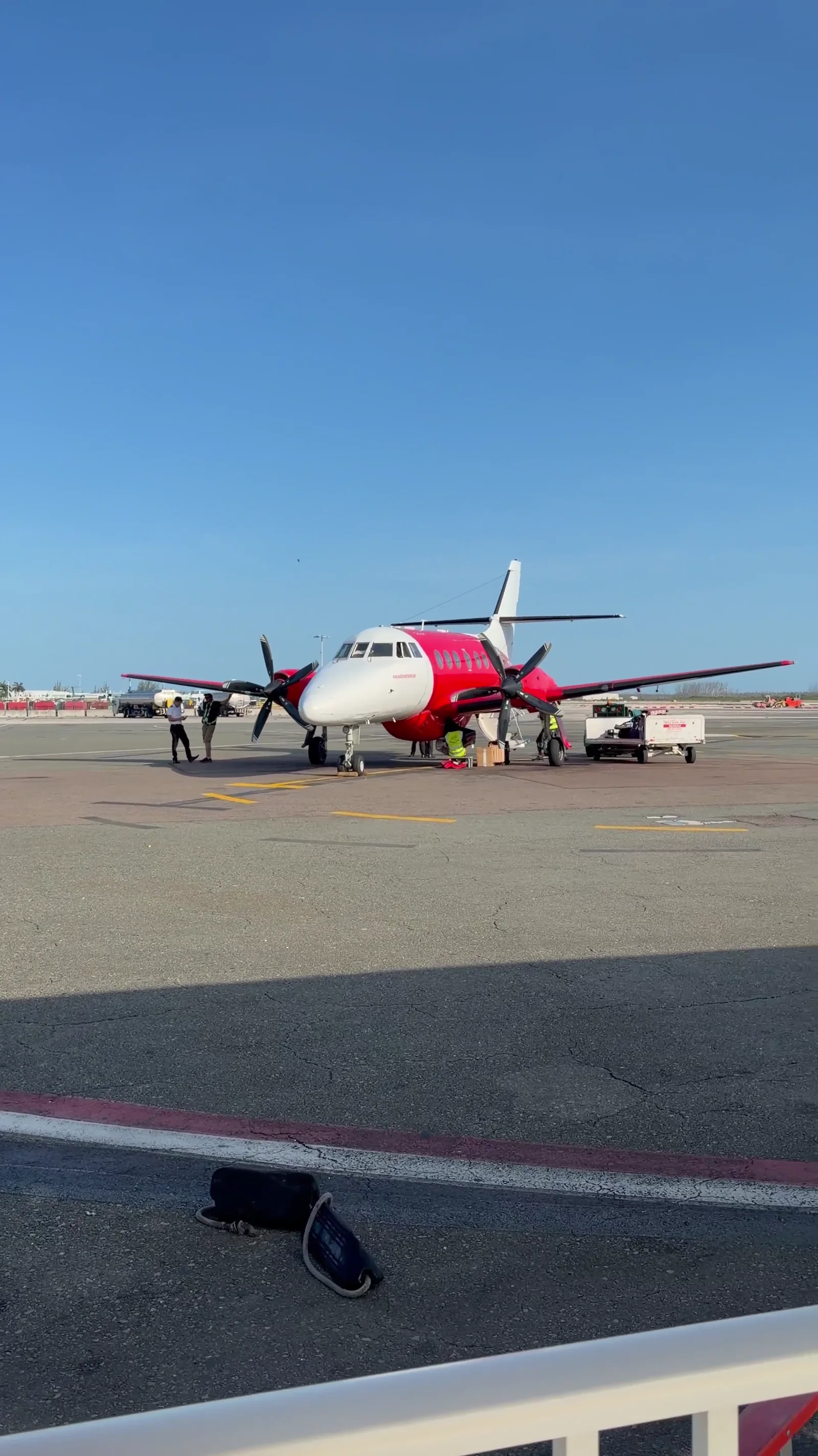 The small plane on the tarmac