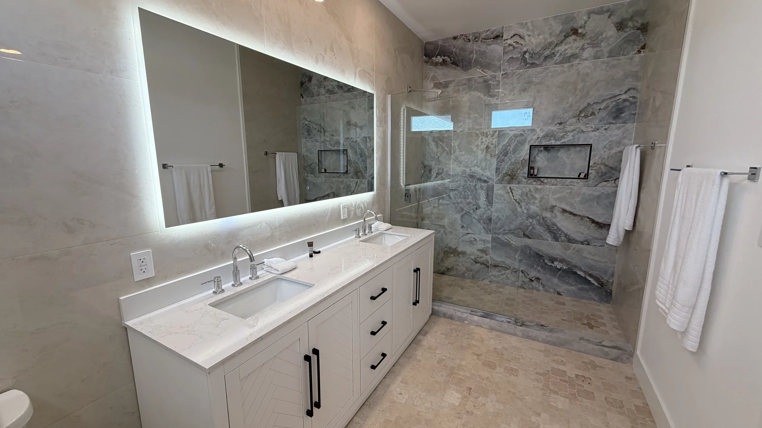 The marble bathroom of an Oceanfront Villa