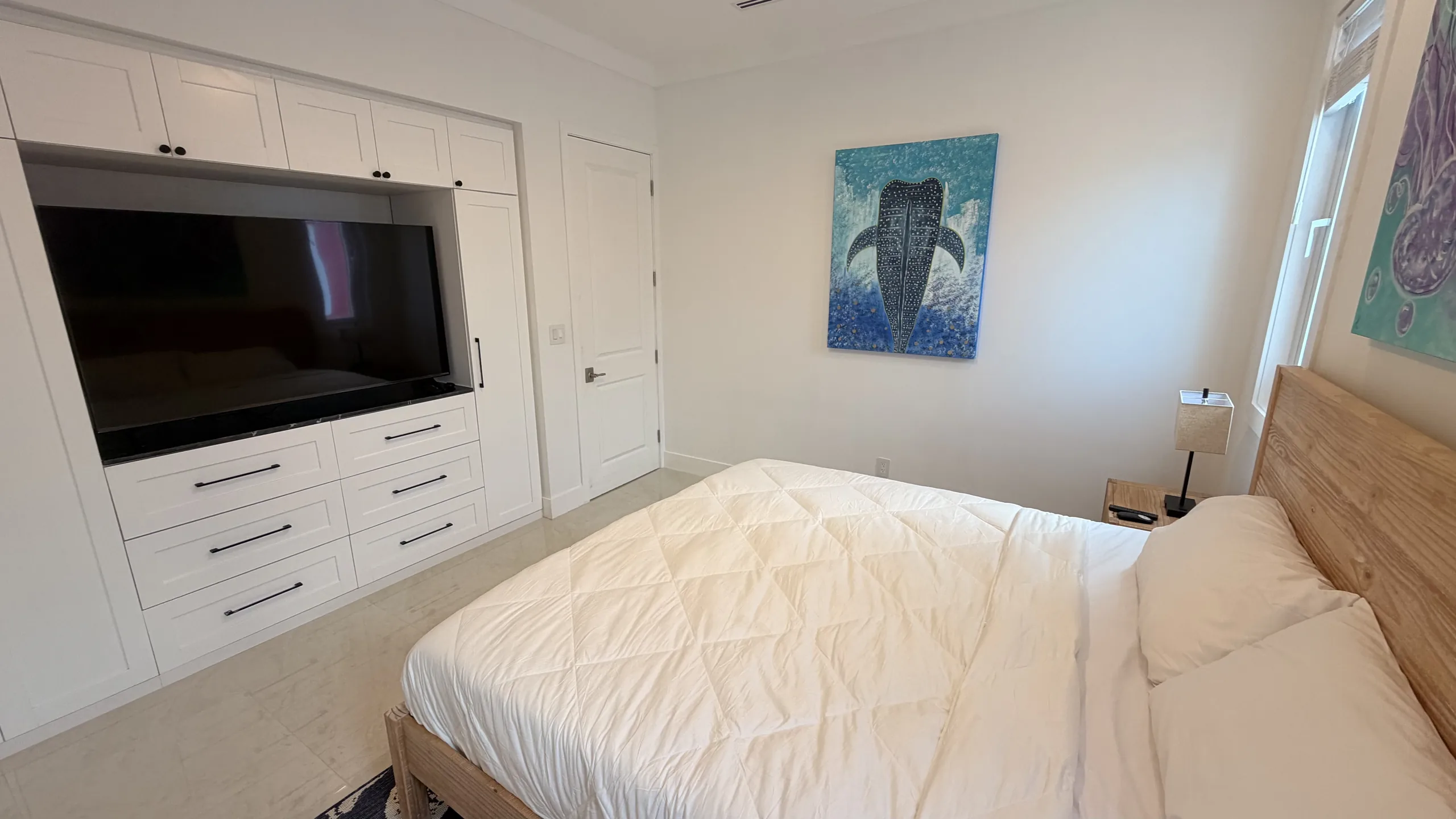 A bedroom in an Oceanfront Villa