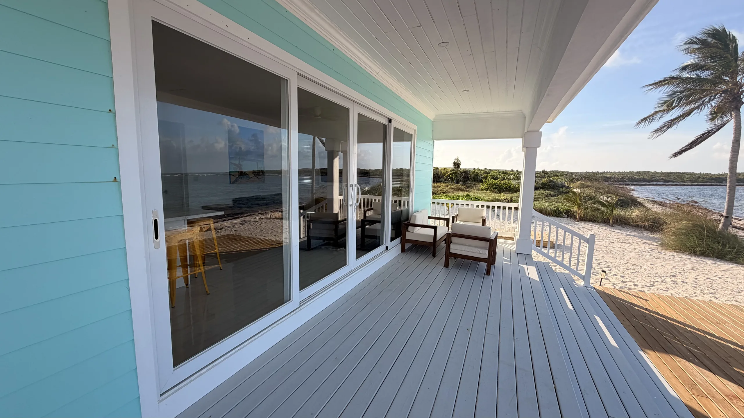 The porch of an Oceanfront Villa overlooking the bay