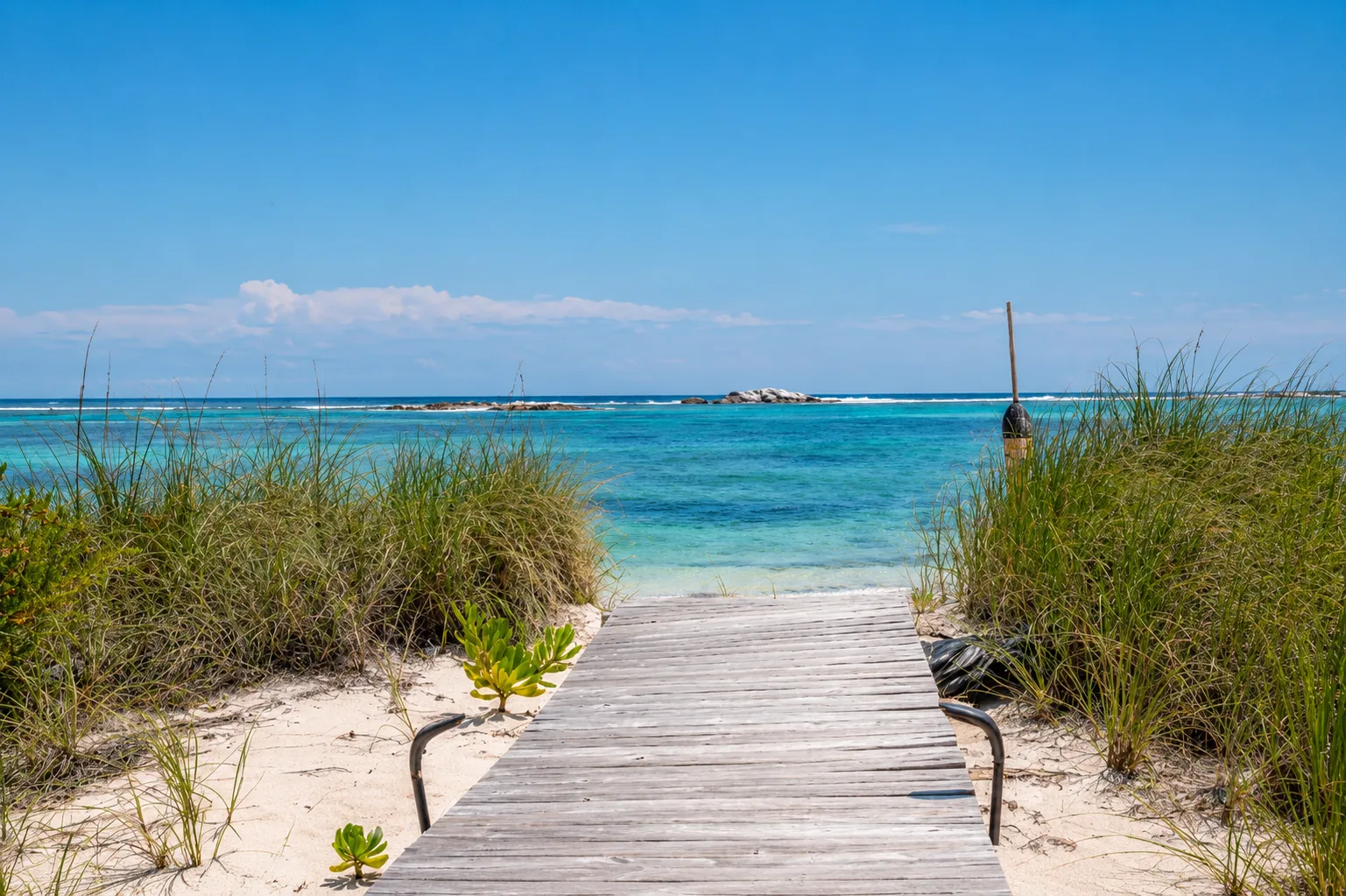 The boardwalk down to the bay at Coconut Bay
